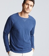 A cool, comfy classic from Vince, the longsleeve sweatshirt with v inset at the neck and raglan sleeves.