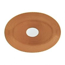 Embellished with an organically complex honeycomb pattern and rendered in gold-tipped earthy hues, the Reynaud Tresor orange medium oval dish lends boho-chic sophistication to the dining table. Embellished with an organically complex honeycomb pattern and rendered in gold-tipped earthy hues, the Reynaud Tresor orange medium oval dish lends boho-chic sophistication to the dining table.