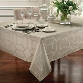 Suitable for either casual or refined entertaining, this tablecloth is the centerpiece of the Tile collection. Elegant cotton covering embellished with a geometric print of patterned tiles allover.