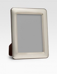 A picture-perfect tabletop design from Barcelona's famed silversmiths, crafted with heirloom detail and rounded corners in gleaming sterling silver. Accommodates a 8 X 10 photograph Made in Spain A picture-perfect tabletop design from Barcelona's famed silversmiths, crafted with heirloom detail and rounded corners in gleaming sterling silver. Accommodates a 8 X 10 photograph Made in Spain
