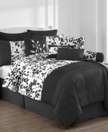 Black, white and chic all over! The Audrey comforter set boasts a silhouette leaf print with embroidered dots for an undeniably stylish look with a fresh, modern allure. This expansive set includes a reversible coverlet for lightweight warmth as well as five coordinating decorative pillows. (Clearance) Black, white and chic all over! The Audrey comforter set boasts a silhouette leaf print with embroidered dots for an undeniably stylish look with a fresh, modern allure. This expansive set includes a reversible coverlet for lightweight warmth as well as five coordinating decorative pillows. (Clearance)