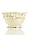 Distinguished by a scalloped edge, bands of gold and heart cutouts in creamy ivory porcelain, this lovely bowl combines traditional style and timeless grace. Qualifies for Rebate