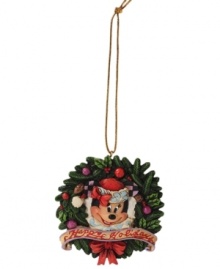 Welcome to the circle of friends! Everyone's favorite Santa stand-in peeks out from a berry-laden wreath to spread Christmas cheer and warmth throughout your home. Welcome to the circle of friends! Everyone's favorite Santa stand-in peeks out from a berry-laden wreath to spread Christmas cheer and warmth throughout your home.