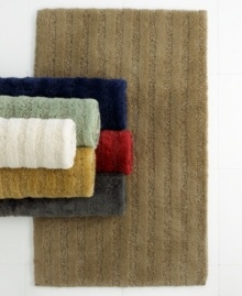 Experience a new level of softness with Lauren Ralph Lauren's Greenwich Stripe contour bath rug, featuring premium Comforel® nylon in a subtle stripe texture and a skid-resistant latex backing for safety. Coordinates with the Greenwich towel collection. Experience a new level of softness with Lauren Ralph Lauren's Greenwich Stripe contour bath rug, featuring premium Comforel® nylon in a subtle stripe texture and a skid-resistant latex backing for safety. Coordinates with the Greenwich towel collection.