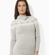 The perennially stylish Fair Isle sweater in an impossibly soft wool-angora blend gets a glamorous update with glittering jeweled buttons at the neckline.