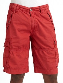 This summer standout features lightly rumpled cotton construction and multiple pockets for utilitarian flair.Mid-width waistband with belt loops and button and interior drawstring closure Front zipper Angled button flap pockets at sides Side cargo pockets Stitching detail throughout Back logo stitching Dual button flap pockets at back Inseam, about 10 Cotton; machine wash Imported