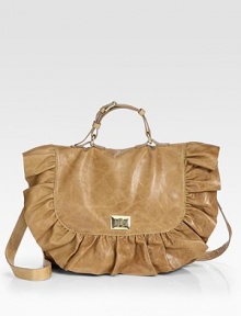 A roomy shape of butter-soft leather, finished with a beautiful ruffled flap-front style. Adjustable top handle, 3½-5½ dropDetachable shoulder strap, 20¼ dropLock closure on front flapOne inside zip pocketCotton lining13½W X 10H X 3½DImported