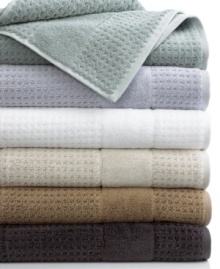 Crafted with plush combed Turkish cotton, this Hammam hand towel features a jacquard woven textured waffle pattern for a luxuriously soft hand that will wrap you in warmth after every shower. Choose from an array of cool and neutral hues. Crafted with plush combed Turkish cotton, this Hammam hand towel features a jacquard woven textured waffle pattern for a luxuriously soft hand that will wrap you in warmth after every shower. Choose from an array of cool and neutral hues.