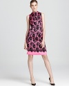 Make a sophisticated statement with this scalloped lace-print Milly shift dress with elegant high neck.