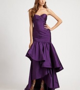 A statement-making design in crisp taffeta with dramatic pleating and a hi-lo flounce hem.StraplessSweetheart necklinePleated bodiceAsymmetric tiered flounce hemSide zipperAbout 46 from natural waistPolyesterDry cleanImportedModel shown is 5'11 (180cm) wearing US size 4. 