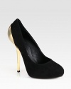 Goldtone metal heel lifts and illuminates this timeless suede platform pump. Metal heel, 5 (125mm)Hidden platform, 1 (25mm)Compares to a 4 heel (100mm)Suede upperLeather lining and solePadded insoleMade in ItalyOUR FIT MODEL RECOMMENDS ordering one half size up as this style runs small. 