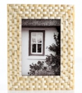 Naturally chic, this Purva picture frame features a thick woven pattern in pure bone, elevating decor with unconventional style and rich texture.