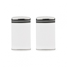 These salt and pepper shakers translate Kate Spade's signature contrast stitching with simple black banding and fine white dots.