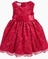 Drenched in sequins, this beautiful Blueberi Boulevard baby dress is perfect for the holidays or other special events.