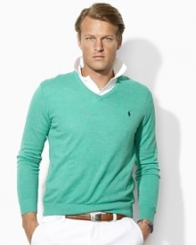The epitome of preppy style, a handsome long-sleeved V-neck sweater is knit from plush cotton and cashmere yarns for a luxuriously soft hand. The epitome of preppy style, a handsome long-sleeved V-neck sweater is knit from plush cotton and cashmere yarns for a luxuriously soft hand.
