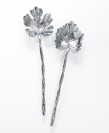 Serve every meal in natural splendor with aluminum Grape Leaf serving utensils. With a realistic texture and long stem handles to evoke life outside your window. Serve every meal in natural splendor with aluminum Grape Leaf serving utensils. With a realistic texture and long stem handles to evoke life outside your window.