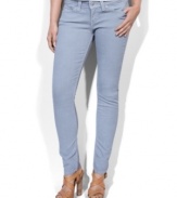 Deviate from your trusty blues! Designed in a winter grey wash, Levi's Demi Curve skinny jeans present a cool new take on neutral.