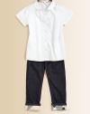A sweet, simple, short-sleeve basic in crisp cotton poplin with Burberry touches.Peter Pan collar with inside check trimShort sleevesButton placketEmbroidered tonal logo at chestSlight shaping through the waistSoft pleating at back for a little fullnessCottonMachine washImported Please note: Number of buttons may vary depending on size ordered. 