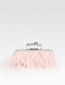 An ultra-feminine style with luxurious dyed ostrich feathers accented with an iconic knuckle closure.Top clasp closureLeather lining8½W X 4H X 1½DMade in Italy