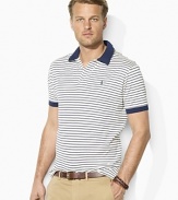 Tailored with a wider body and longer hem, a classic-fitting striped polo is designed for easy movement and breathability in luxurious cotton lisle.