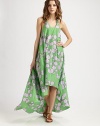 Whimsically designed for a charming look, this coverup features a pretty print, an intriguing back and a flirty high-low hem.ScoopneckSleevelessKeyhole detail on unique racerbackHigh-low hemSilkHand washImported