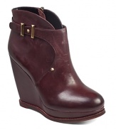 With subtle studded details, Sam Edelman's Dalton wedge boots show off a tall silhouette with belted accents.