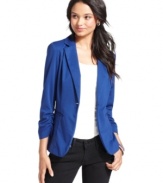 Create a colorful finish to your day or night ensemble with this electric, three-quarter sleeve blazer from BCX!