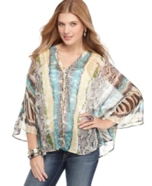 Prints of all stripes unite in this chiffon poncho top from Fire! Pairs perfectly with fun accessories for an effortless weekend look. Prints of all stripes unite in this chiffon poncho top from Fire! Pairs perfectly with fun accessories for an effortless weekend look.