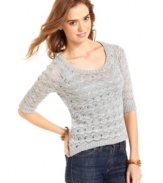 Layer-up this season in an open-knit sweater that comes loaded with metallic threading for a shot of pizzazz!