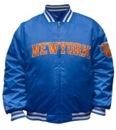 You'll be the best looking fan on the block and in the arena sporting this jacket featuring the NY Knicks by Majestic.