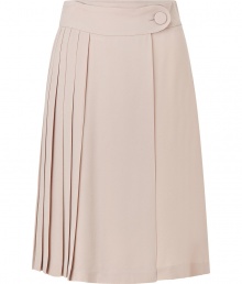 Feminine and flirty, this lovely blush-hued pleated skirt from Tara Jarmon is a chic must-have - Wide waistband with button-tab, full skirt with asymmetric pleating - Pair with a tie-neck blouse and heels