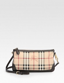 Signature check highlights this zip-top PVC bag, finished with rich leather trim.Removable adjustable shoulder strap, 20¾-24 dropTop zip closureNylon lining10W X 5¾H X 1½DImported