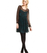 Sheer accents create the loveliest contrast on a dress of deep and swirling print! From Jessica Simpson.