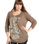 Snag a standout casual look with Style&co.'s three-quarter-sleeve plus size top, showcasing an embellished print.