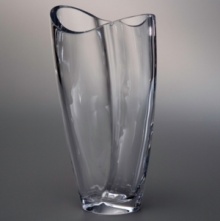 The joyful grace of nature's most precious creatures comes alive in the refreshing Butterfly collection from Nambé. With a sweeping, romantic style and purposeful construction, this fine vase lends cheer to any setting. Designed by Neil Cohen for Nambé. The joyful grace of nature's most precious creatures comes alive in the refreshing Butterfly collection from Nambé. With a sweeping, romantic style and purposeful construction, this fine vase lends cheer to any setting. Designed by Neil Cohen for Nambé.