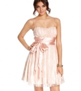 Overlaid in girlish lace and adorned with a sweet satin sash, this dress from B Darlin caters to your femme party style.