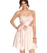 Overlaid in girlish lace and adorned with a sweet satin sash, this dress from B Darlin caters to your femme party style.