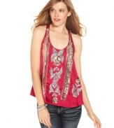 Shimmer like no other in a relaxed fit top adorned with sequins! From XOXO.