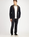 A comfortable zip-front style made of soft, mercerized cotton jersey.Front zipperAttached hoodCottonMachine washImported