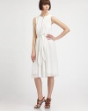 Finely pleated silk drapes on this feminine silhouette, with delicate semi-sheer overlay for an ethereal effect. Slit jewelneck with hook closureWide shoulder strapsSleevelessAllover pleatsSelf-tie belted waistDual front slash pocketsAbout 27 from natural waistSilkDry cleanImportedModel shown is 5'10.5 (179cm) wearing US size 4.