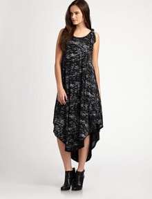 Dappled knit in a loose-fitting, easy-to-wear style accented with a twisted shoulder detail.ScoopneckSleevelessTwisted shoulder detailAsymmetrical hemlineAbout 31 from natural waist at shortest point50% polyester/38% cotton/12% rayonMachine washMade in USAModel shown is 5'9½ (176 cm) wearing US size Small. Dappled knit in a loose-fitting, easy-to-wear style accented with a twisted shoulder detail.ScoopneckSleevelessTwisted shoulder detailAsymmetrical hemlineAbout 31 from natural waist at shortest point50% polyester/38% cotton/12% rayonMachine washMade in USAModel shown is 5'9½ (176 cm) wearing US size Small.