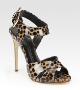 Patent leather style in a lavish leopard print with an adjustable slingback strap. Stacked heel, 4½ (115mm)Patent leather upperLeather lining and solePadded insoleMade in Italy