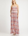 For a casual-cool spring look that is sure to turn heads, this floor-sweeping maxi dress in a bold, vibrant print is the perfect choice. StraplessBuilt-in bra for added supportBanded elastic waistAllover graphic printAbout 62 from natural waist92% modal/8% spandexDry cleanMade in USAModel shown is 5'9 (176cm) wearing US size Small.
