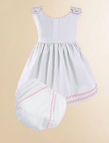 An adorable look for a picnic or a portrait in lightweight cotton piqué with vibrant rick rack trim and a matching diaper cover. Covered button shoulder closures High waist Cotton; machine wash Made in USA Please note: Diaper cover cannot be personalized.FOR PERSONALIZATION Select a quantity, then scroll down and click on PERSONALIZE & ADD TO BAG to choose and preview your personalization options. Please allow 2 to 3 weeks for delivery.