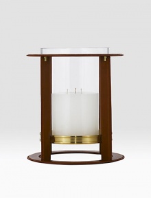 Crafted from gleaming glass, and encased in a supple saddle leather frame to evoke a heritage panache.12 L x 14¼ H6 X 6 candle recommendedLeather, glass and brassImported Crafted from gleaming glass, and encased in a supple saddle leather frame to evoke a heritage panache.12 L x 14¼ H6 X 6 candle recommendedLeather, glass and brassImported