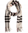 Finish your look on an iconic note with Burberry Londons giant check scarf, detailed in brushed cashmere for luxuriously cozy results - Fringing at both ends - Wear inside over bright knit sweaters, or outdoors over classic coats with leather gloves