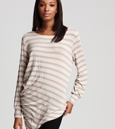 Classic stripes cleverly juxtapose a hypermodern asymmetrical silhouette in this sumptuously slouchy Kain sweater.