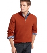 This solid sweater from Izod will step-up to become your go to layering piece for the season.