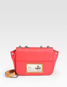 Sumptuous vachetta leather in a demure turnlock flap silhouette, topped with a polished chain and leather shoulder strap.Chain and leather shoulder strap, 12-23 dropTurnlock flap closureOne outside open pocketOne inside zip pocketOne inside open pocketFaille lining7¼W X 5¼H X 1¾DImported