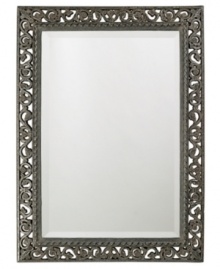 Open scrolling vines wind up and around the fabulously old-fashioned Bristol mirror. In antique-finished black with silver highlights and inner cording, this striking piece is a stylish throwback to elegant ages past. Open scrolling vines wind up and around the fabulously old-fashioned Bristol mirror. In antique-finished black with silver highlights and inner cording, this striking piece is a stylish throwback to elegant ages past.